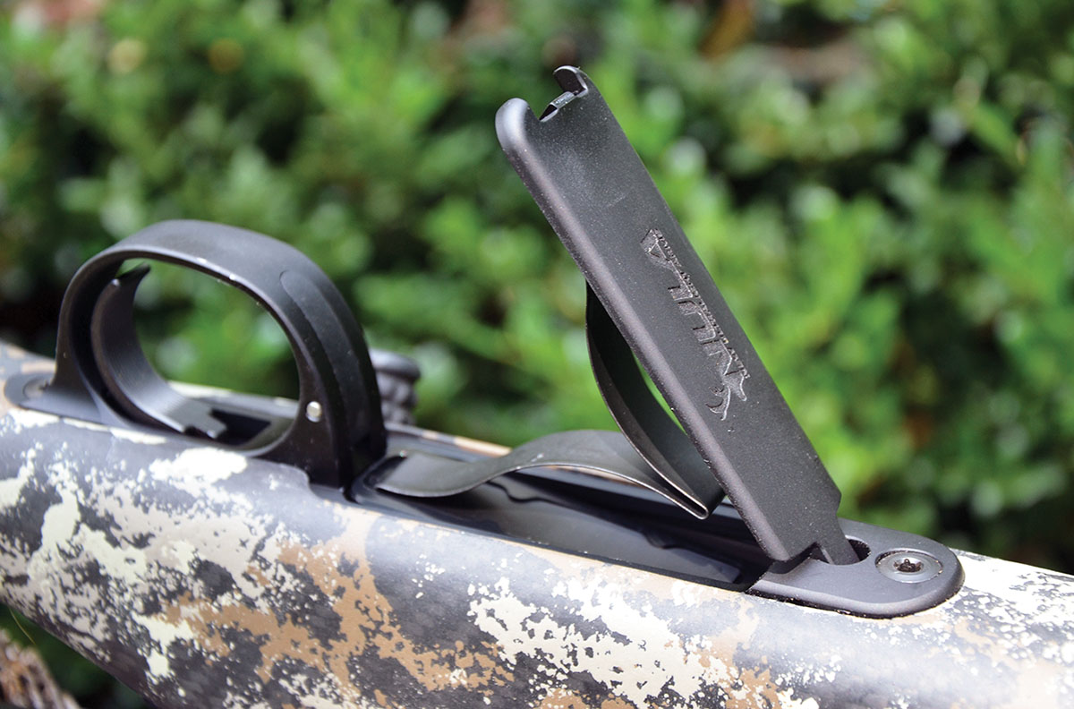 The internal length of the 4-round magazine is  3 inches. Pushing a button inside the trigger guard releases the hinged floorplate.